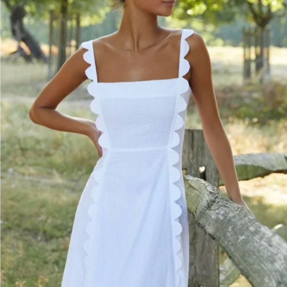 Wiggy Kit white seersucker apron dress